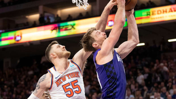 March 16, 2024; Sacramento, California, USA; New York Knicks center Isaiah Hartenstein (55) blocks the shot attempt by Sacramento Kings forward Domantas Sabonis (10) during the fourth quarter at Golden 1 Center. Mandatory Credit: Kyle Terada-USA TODAY Sports  